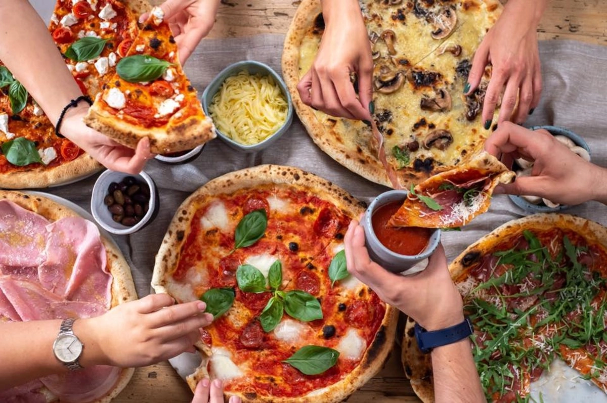 România, vicecampioană mondială la pizza. Cine este românul care a comandat aproape 400